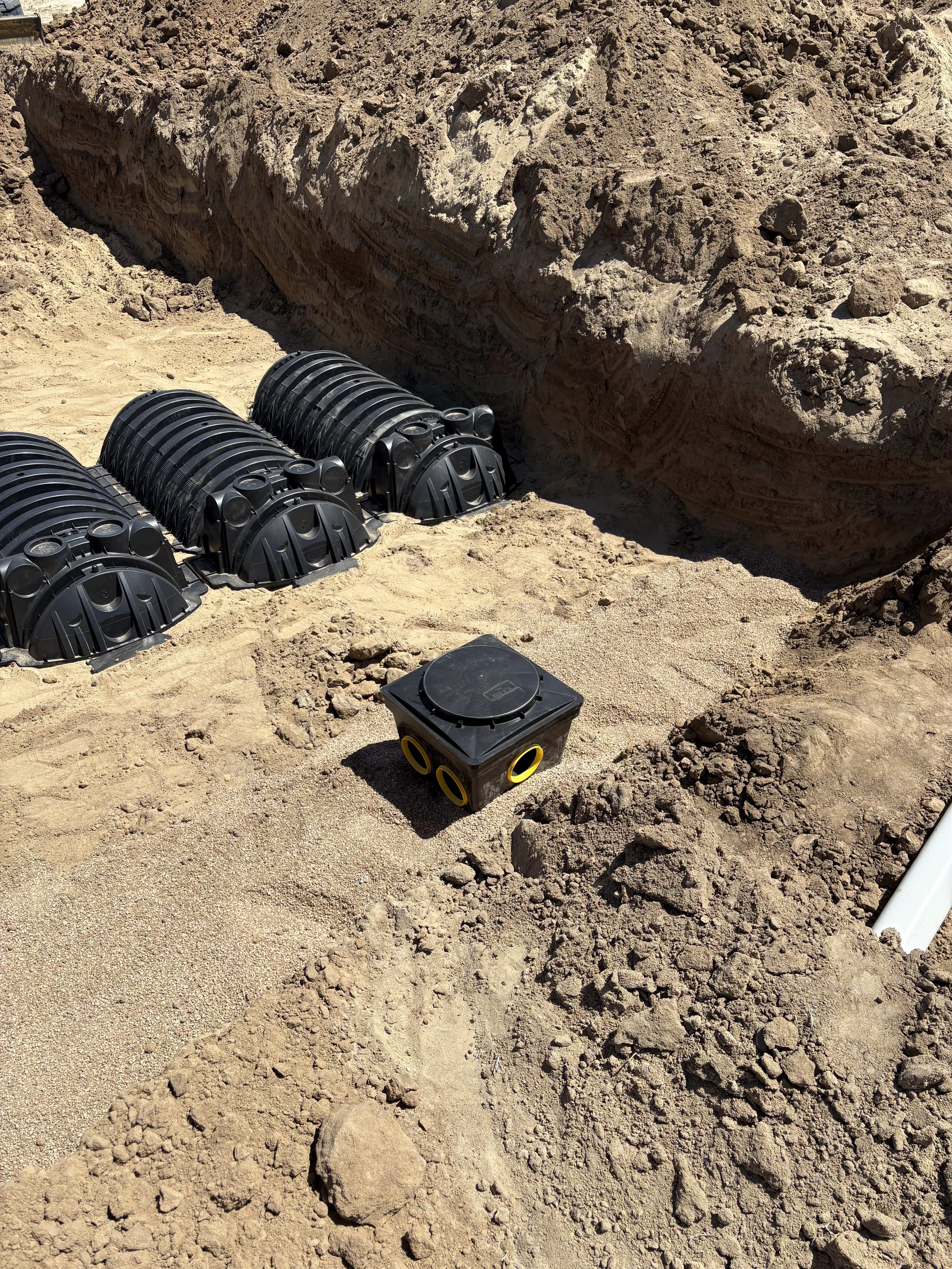 Distribution box connected to Infiltrator chamber lateral lines