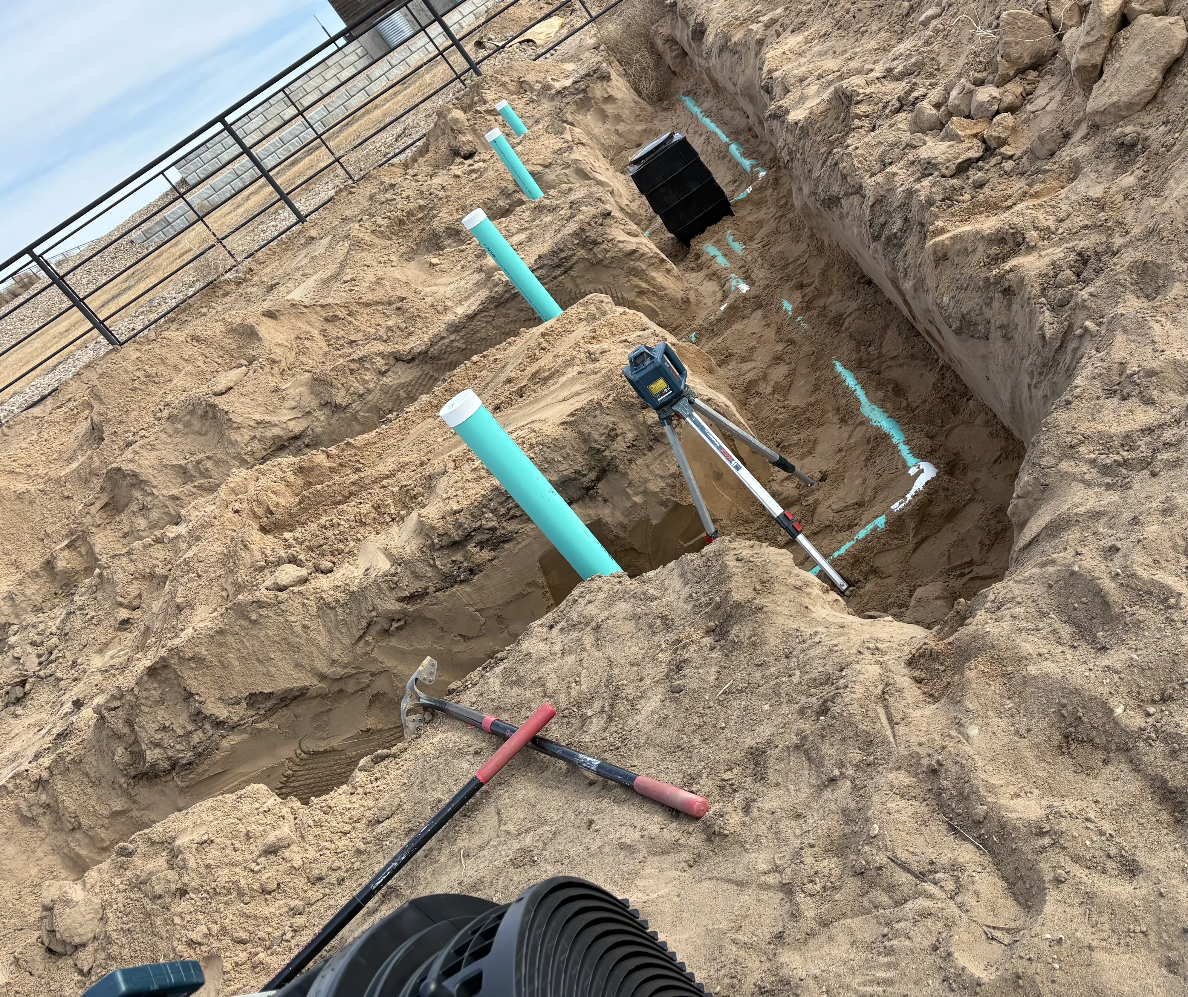 Precision rotary laser level in trench excavation
