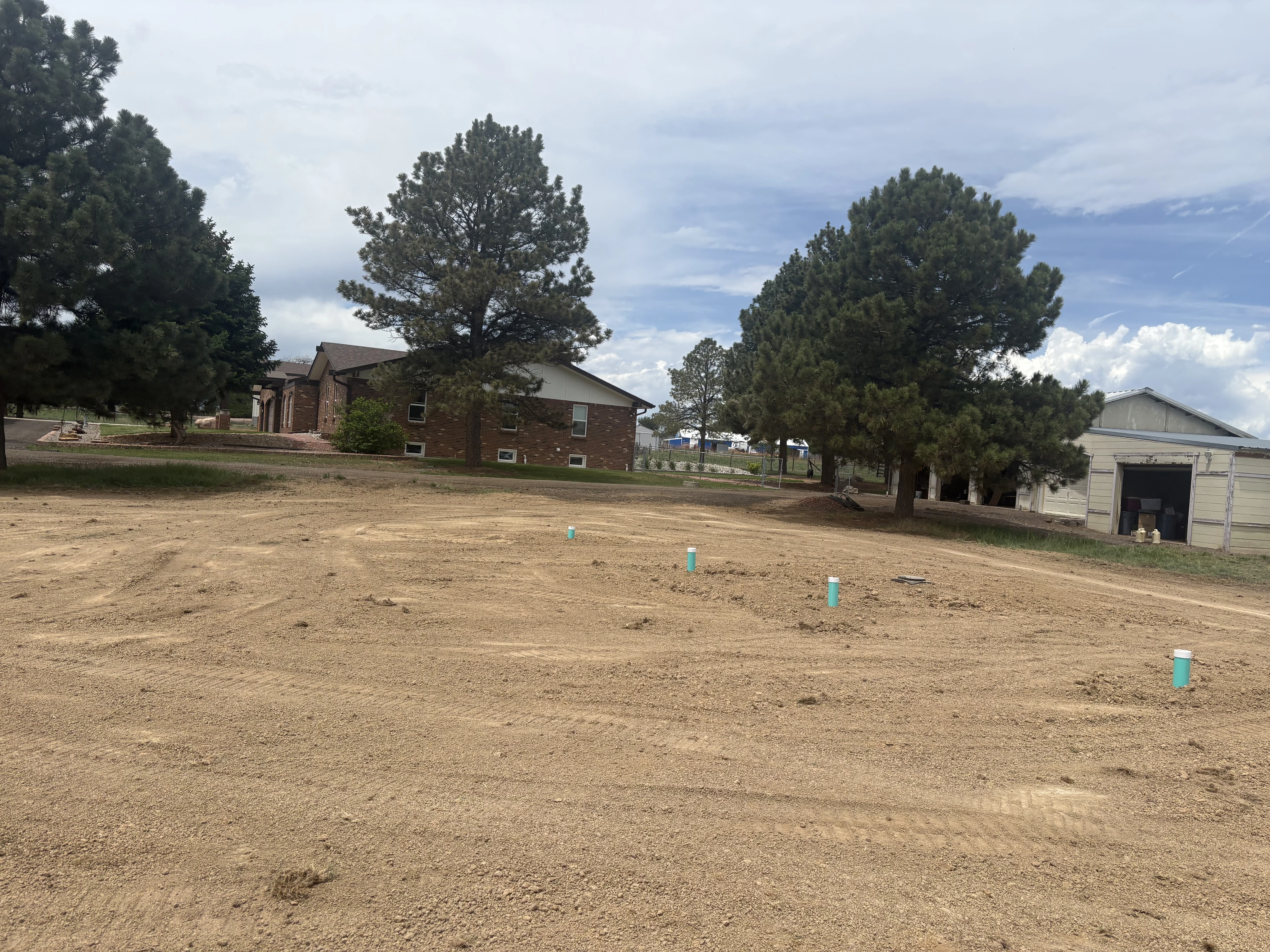 Completed drain field installation after clean backfill and grading