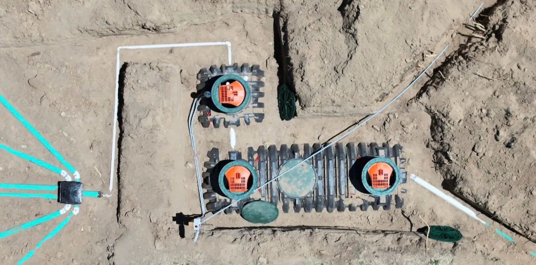 Structural septic tank placement and line connection in Hudson Colorado